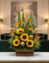 Arreglo floral Fantasía con girasoles vibrantes, exóticas aves del paraíso y detalles verdes en cesta de mimbre, sobre mesa d
