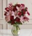 Arreglo floral Nabila con 30 rosas rojas y lirios rosados en un jarrón de cristal, ideal para ecommerce.