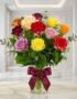 Jarron de Rosas CRISTINA con 12 rosas de diferentes colores vibrantes, como rojo, amarillo, rosa, morado y naranja, con folla